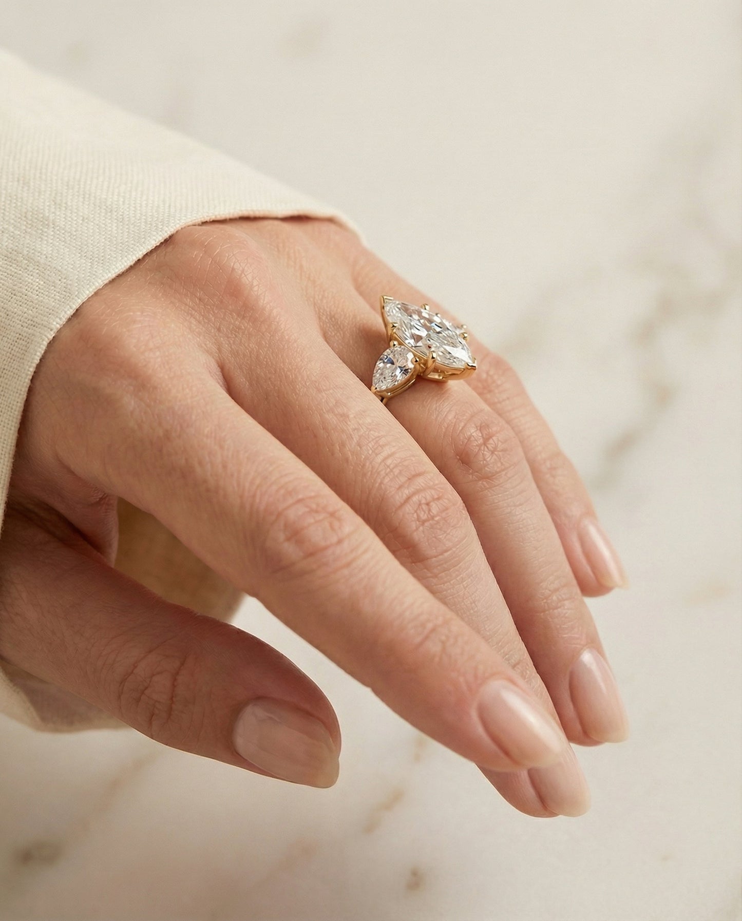 Three Stone Matched Shape Marquise, in 18K Yellow Gold, prong setting – lifestyle shot | RockHer