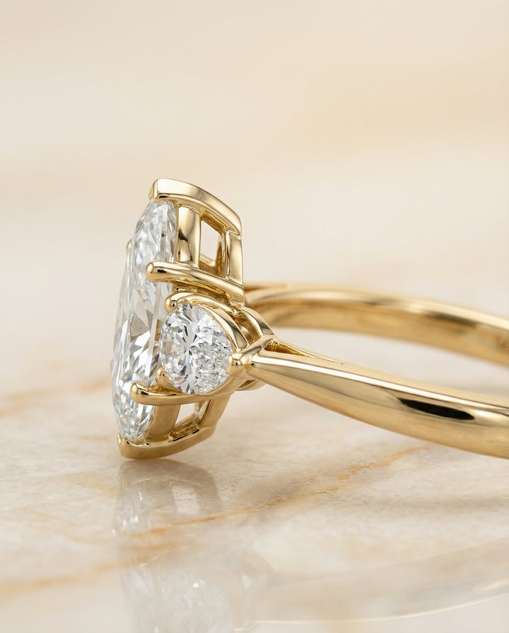 Three Stone Matched Shape Marquise, in 18K Yellow Gold, prong setting – side profile | RockHer