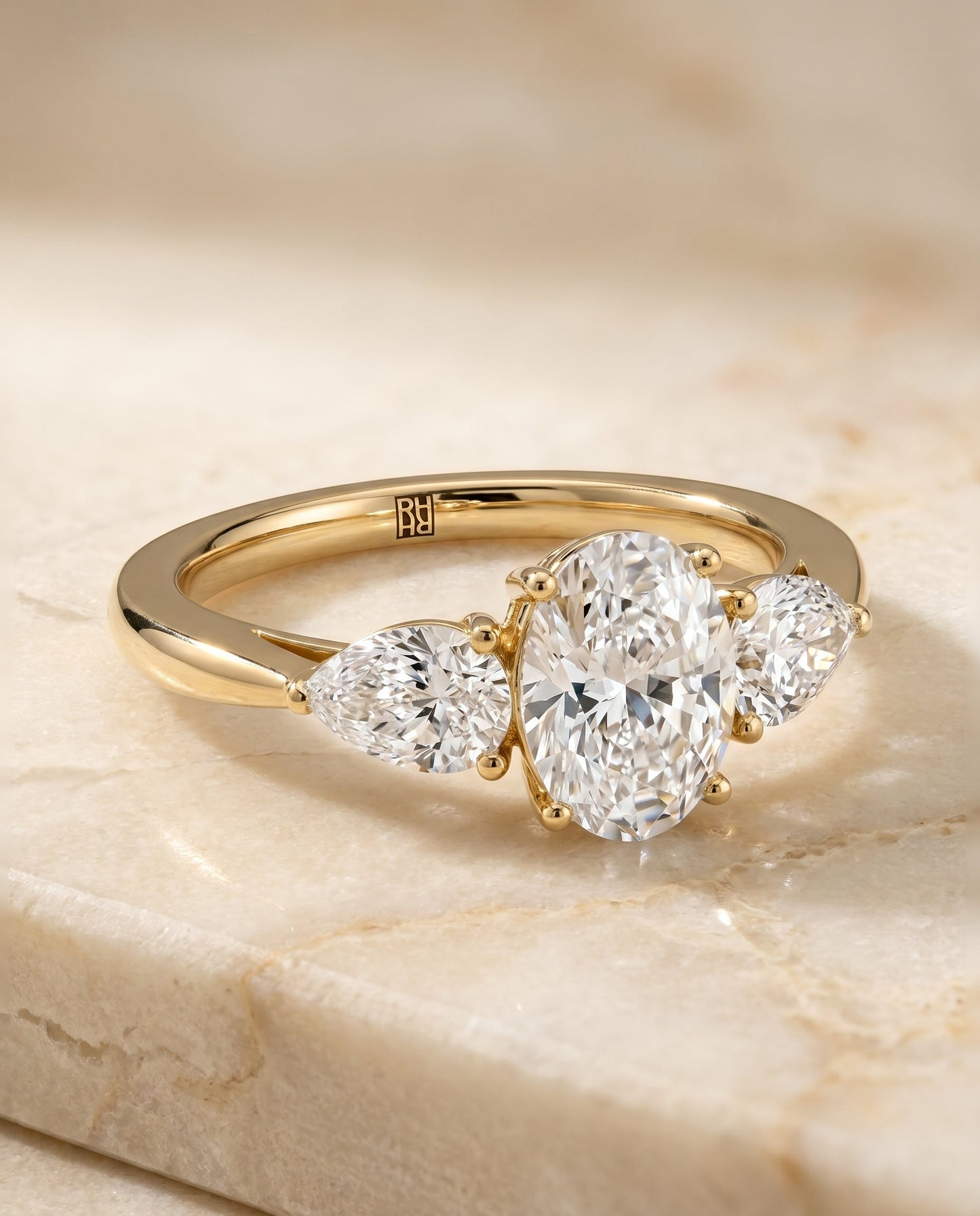 Angelica Select Three Stone Matched Shape Oval Solitaire in 18K Yellow Gold – view 1