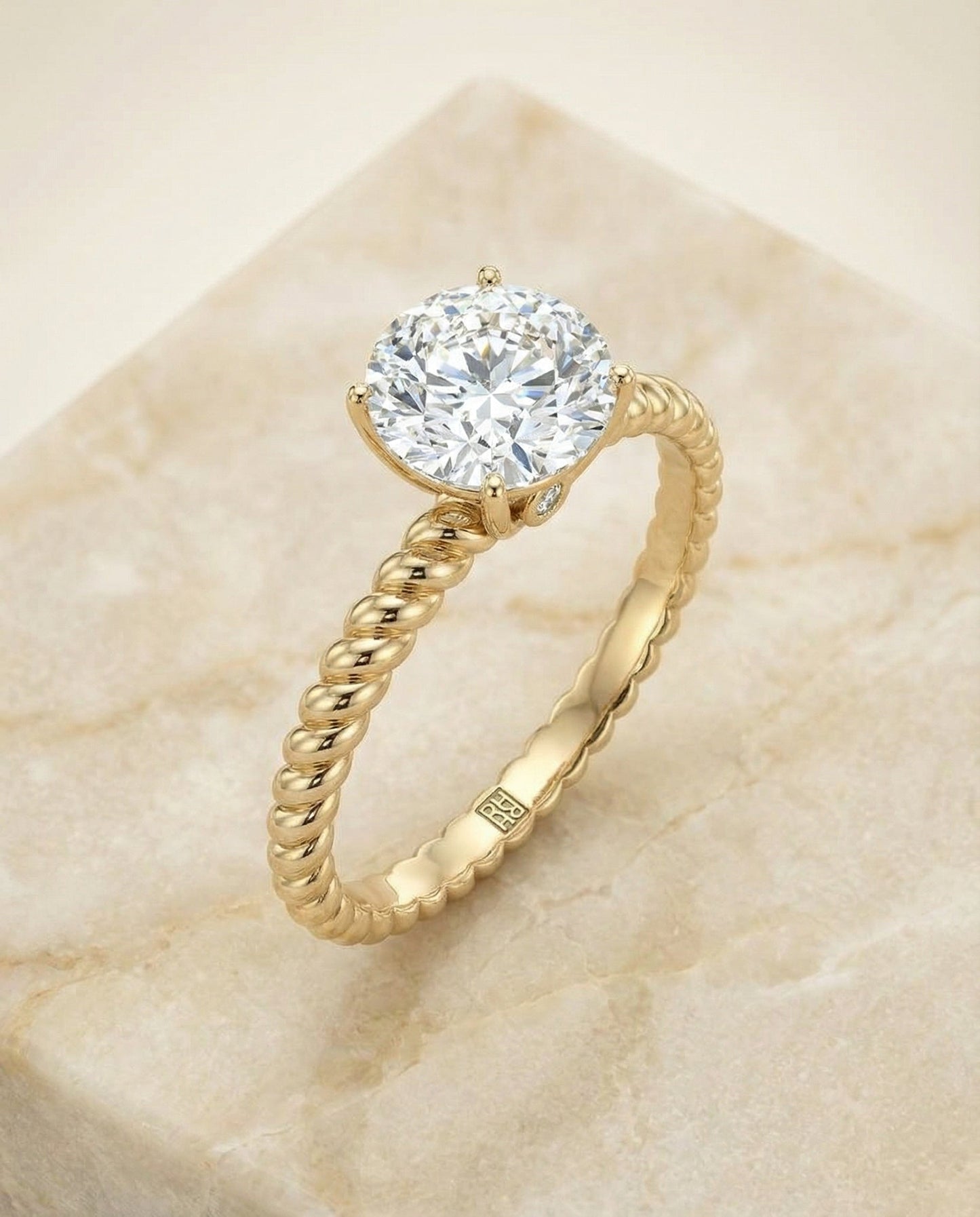 Round Brilliant, Twisted Rope Surprise Stone Solitaire, in 18K Yellow Gold – angled view | RockHer