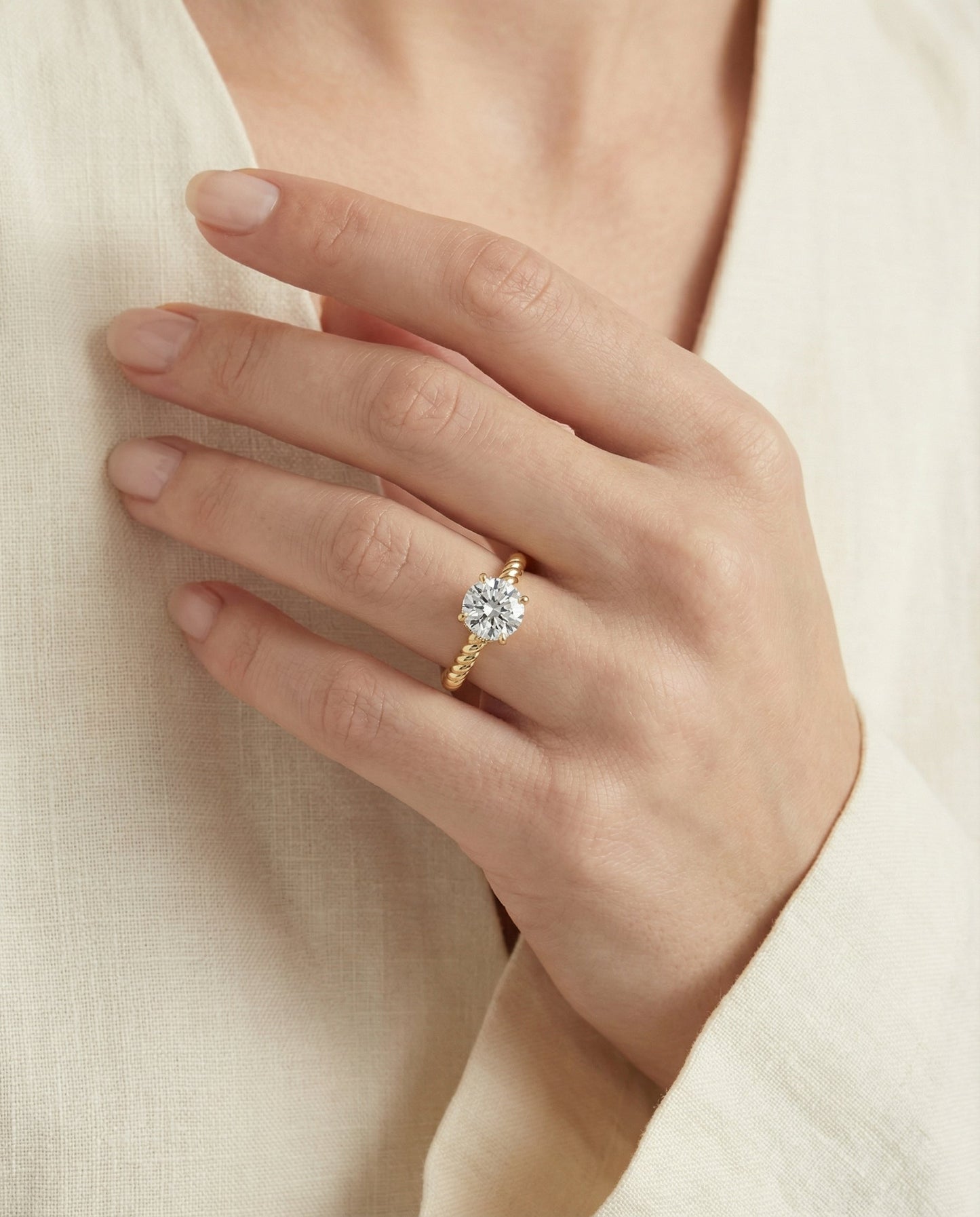 Round Brilliant, Twisted Rope Surprise Stone Solitaire, in 18K Yellow Gold – lifestyle shot | RockHer