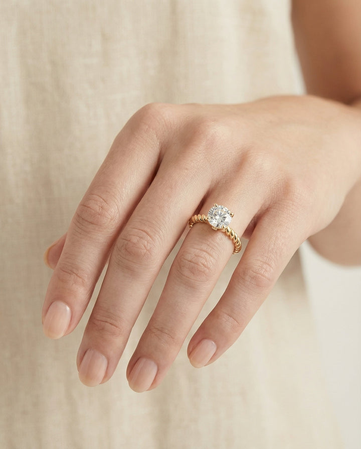 Round Brilliant, Twisted Rope Surprise Stone Solitaire, in 18K Yellow Gold – lifestyle shot | RockHer
