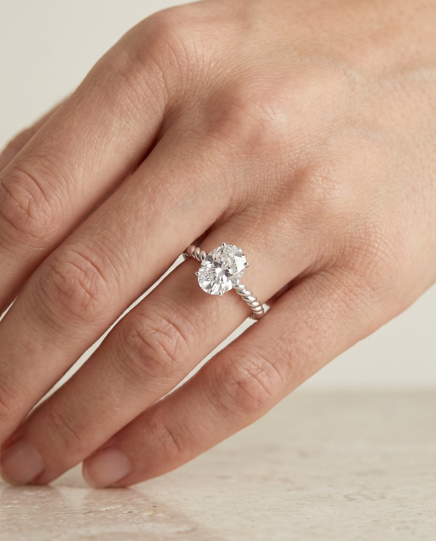 Twisted Rope Surprise Stone Solitaire Oval, in Platinum – lifestyle shot | RockHer