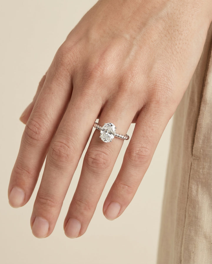 Oval, Twisted Rope Surprise Stone Solitaire, in 18K White Gold – lifestyle shot | RockHer