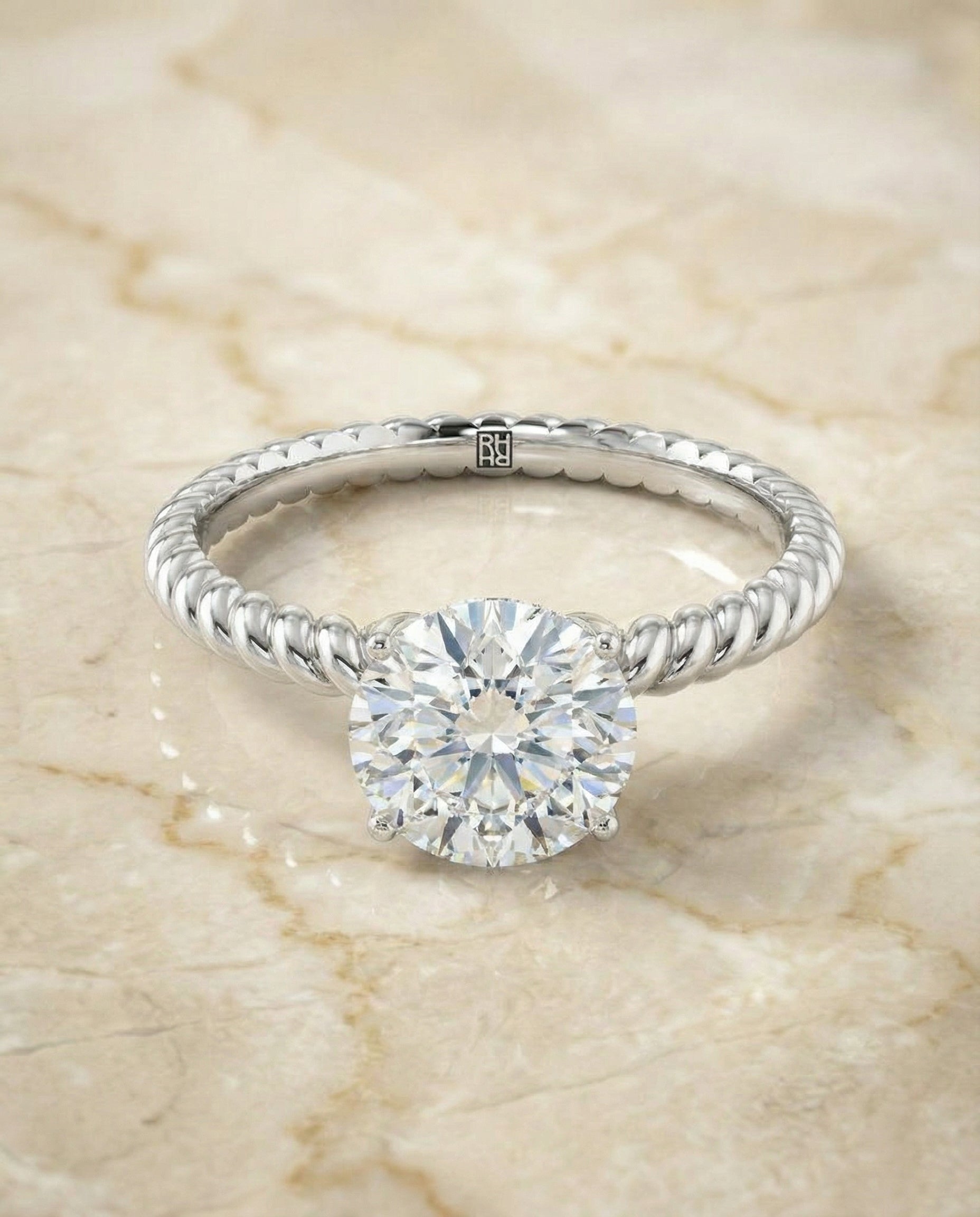 Round Brilliant, Twisted Rope Surprise Stone Solitaire, in Platinum – angled view | RockHer
