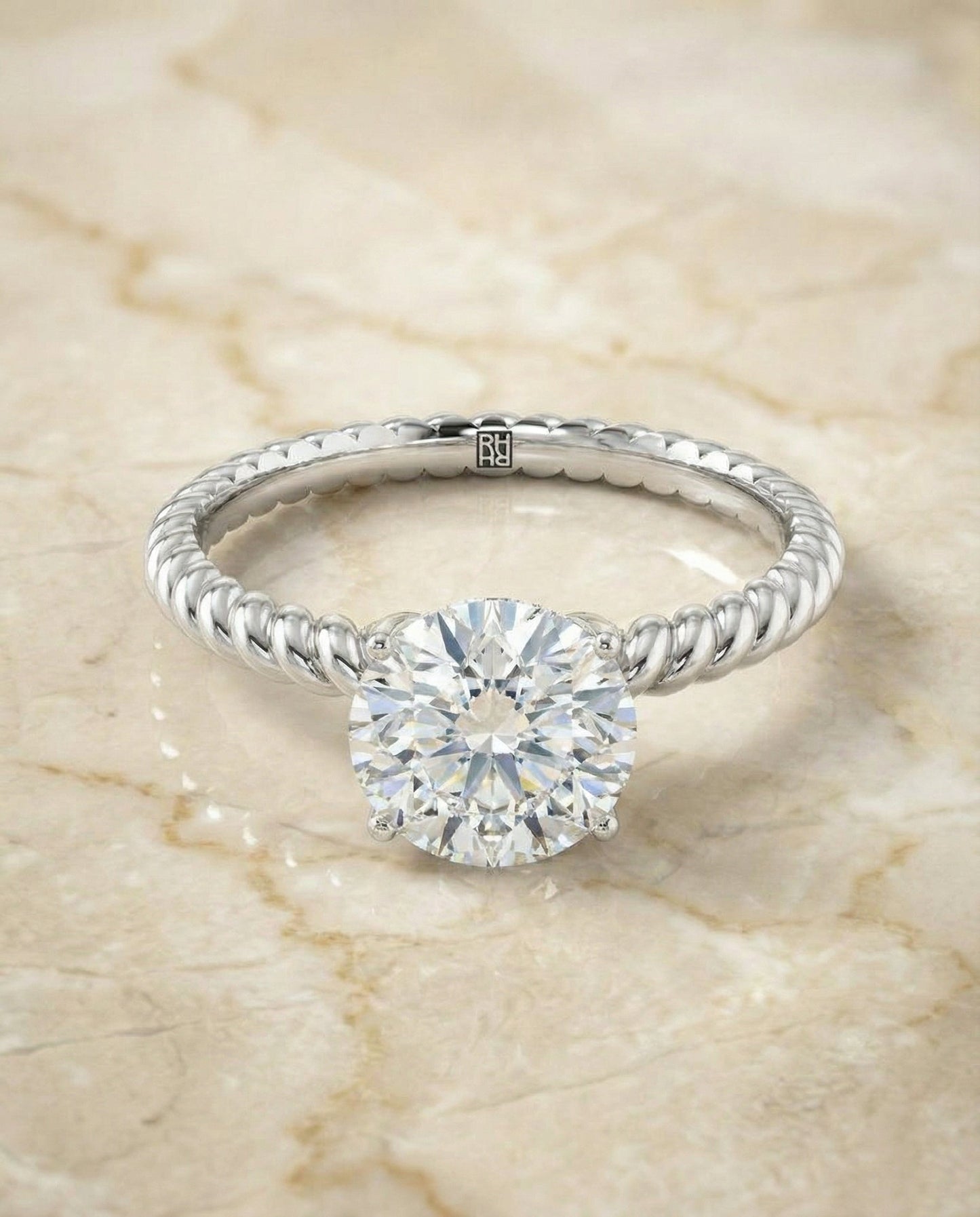 Round Brilliant, Twisted Rope Surprise Stone Solitaire, in Platinum – angled view | RockHer