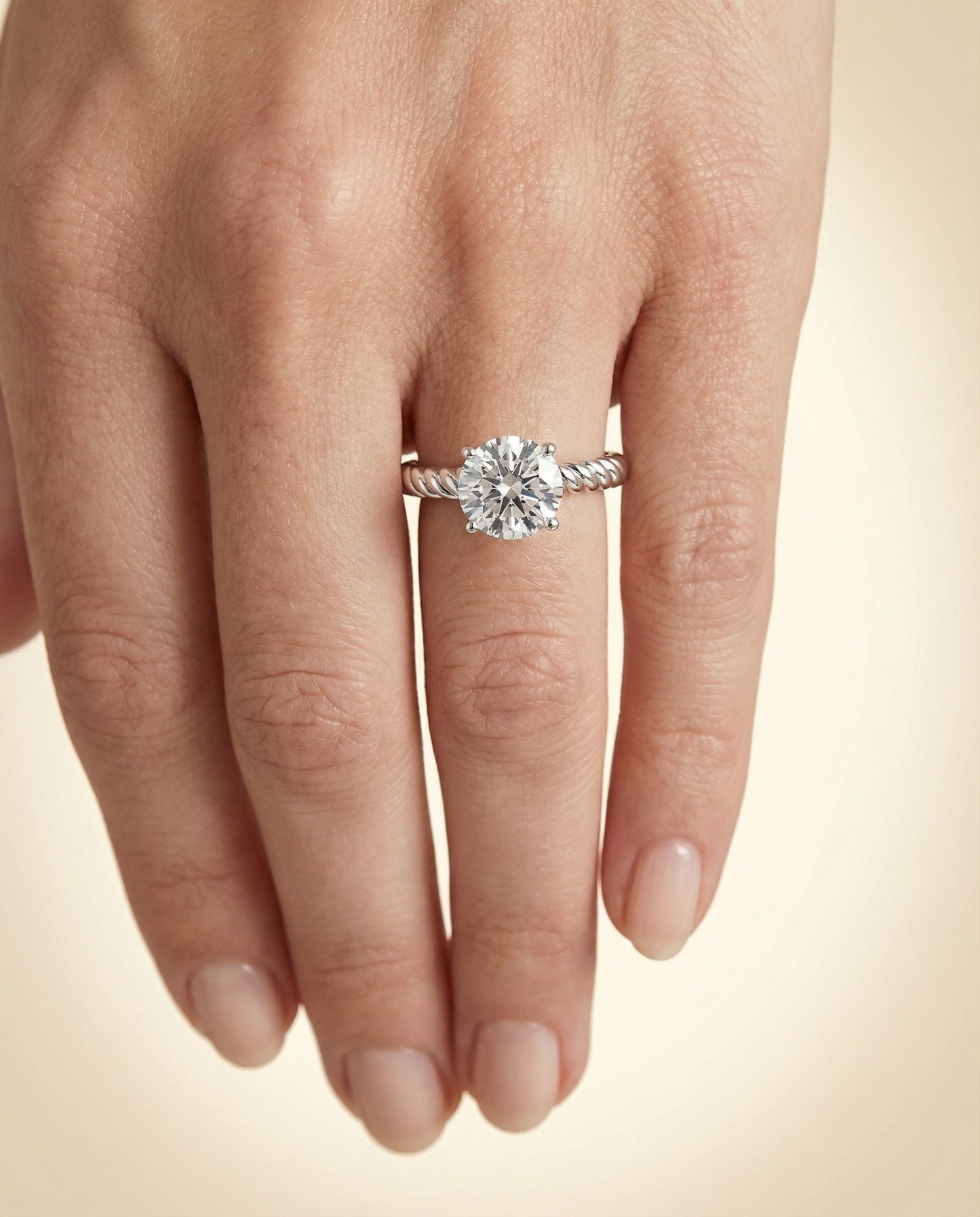 Round Brilliant, Twisted Rope Surprise Stone Solitaire, in Platinum – lifestyle shot | RockHer