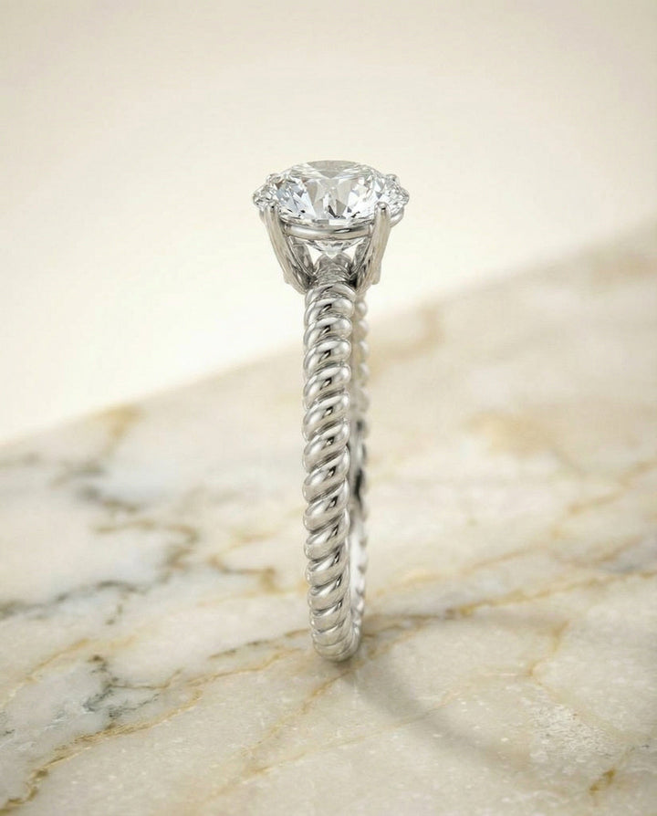 Round Brilliant, Twisted Rope Surprise Stone Solitaire, in Platinum – side profile | RockHer