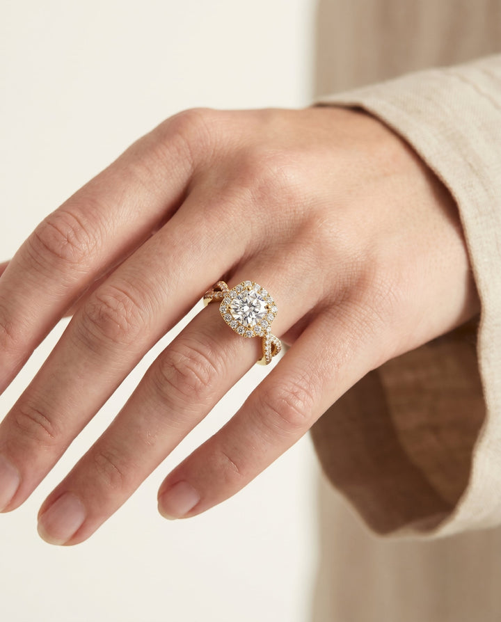 The Audra Twisted Scalloped Pavé Halo Engagement Ring Setting for Cushion Diamonds in 18K Yellow Gold