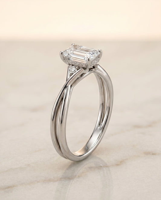 The Dusty Twisted Hidden Halo Solitaire Engagement Ring Setting for Emerald Cut Diamonds in Platinum | RockHer