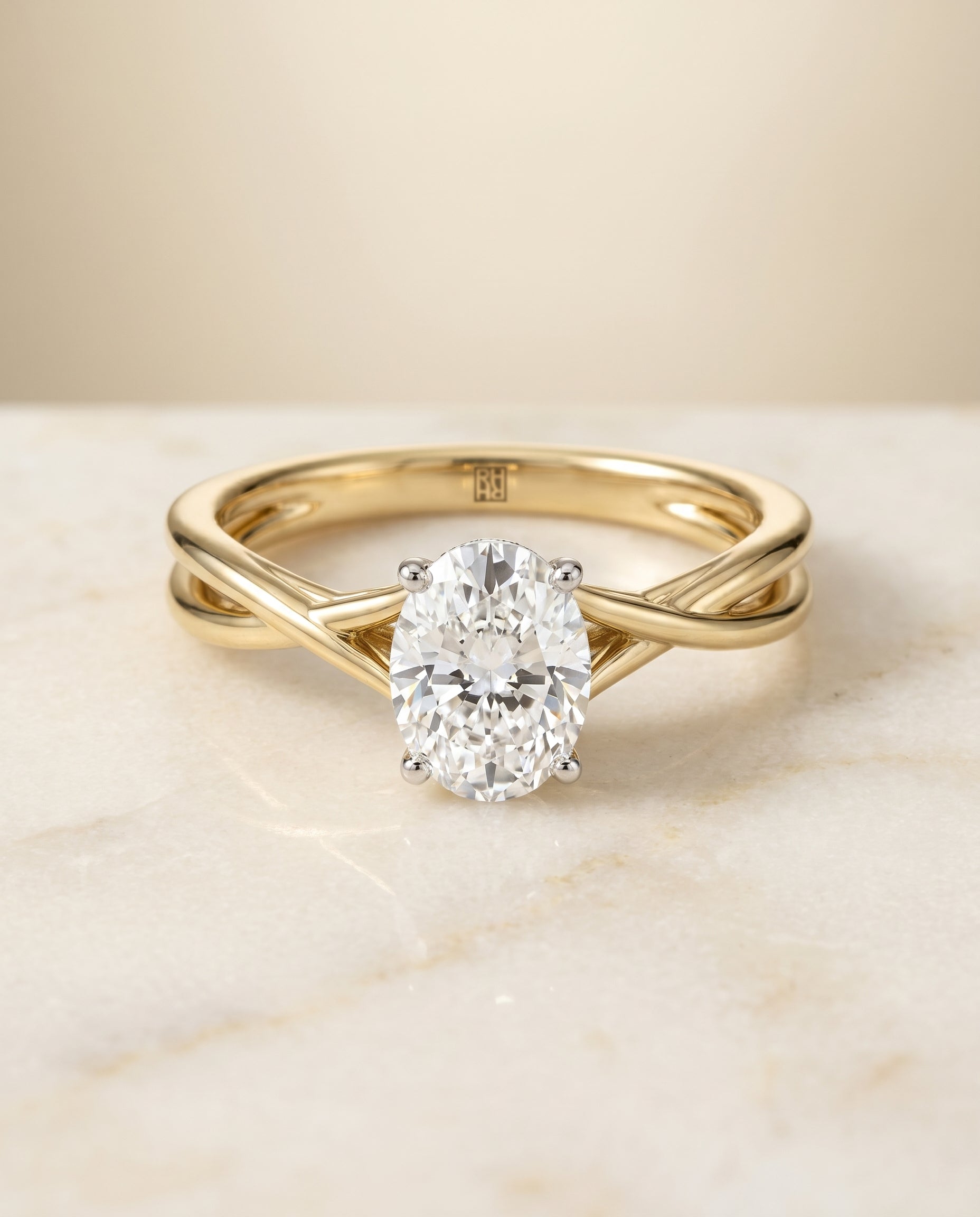 The Grace Twisted Hidden Halo Solitaire Engagement Ring Setting for Oval Diamonds in 18K Yellow Gold | RockHer