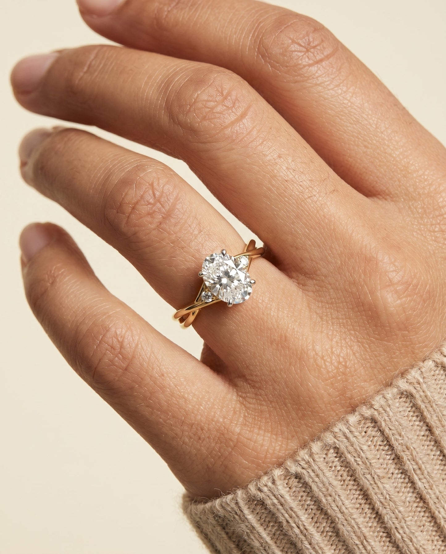 Dusty Select Twisted Shank Hidden Halo Solitaire Oval in 14K Yellow Gold – view 3