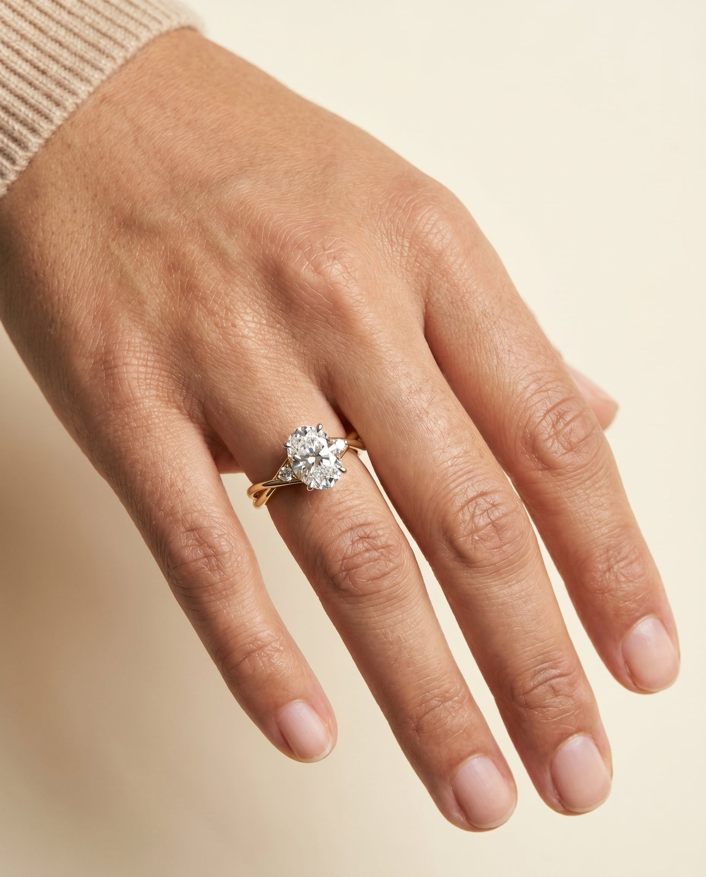 Dusty Select Twisted Shank Hidden Halo Solitaire Oval in 14K Yellow Gold – view 5