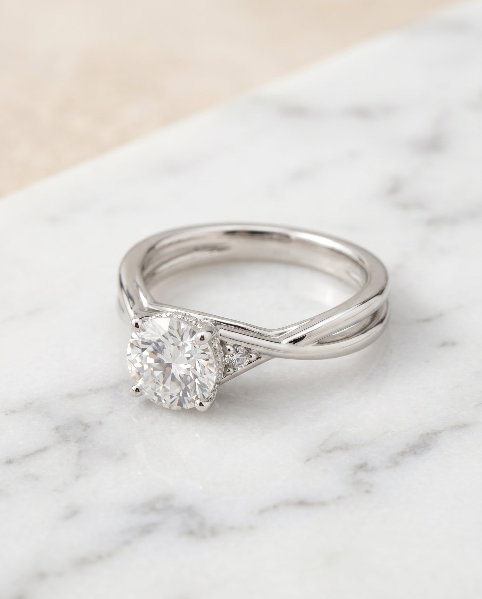 Dusty Select Twisted Shank Hidden Halo Solitaire in Platinum – view 1