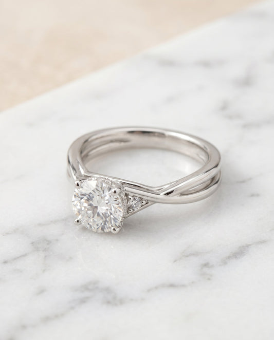Dusty Select Twisted Shank Hidden Halo Solitaire in Platinum – view 1