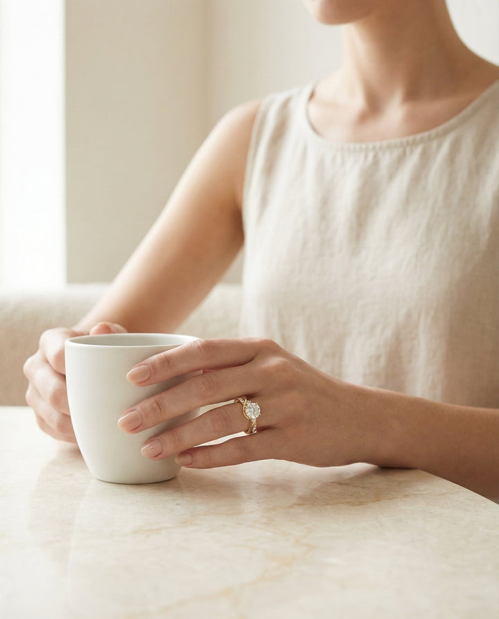 Round Brilliant, Twisted Three Stone, in 18K Yellow Gold – lifestyle shot | RockHer