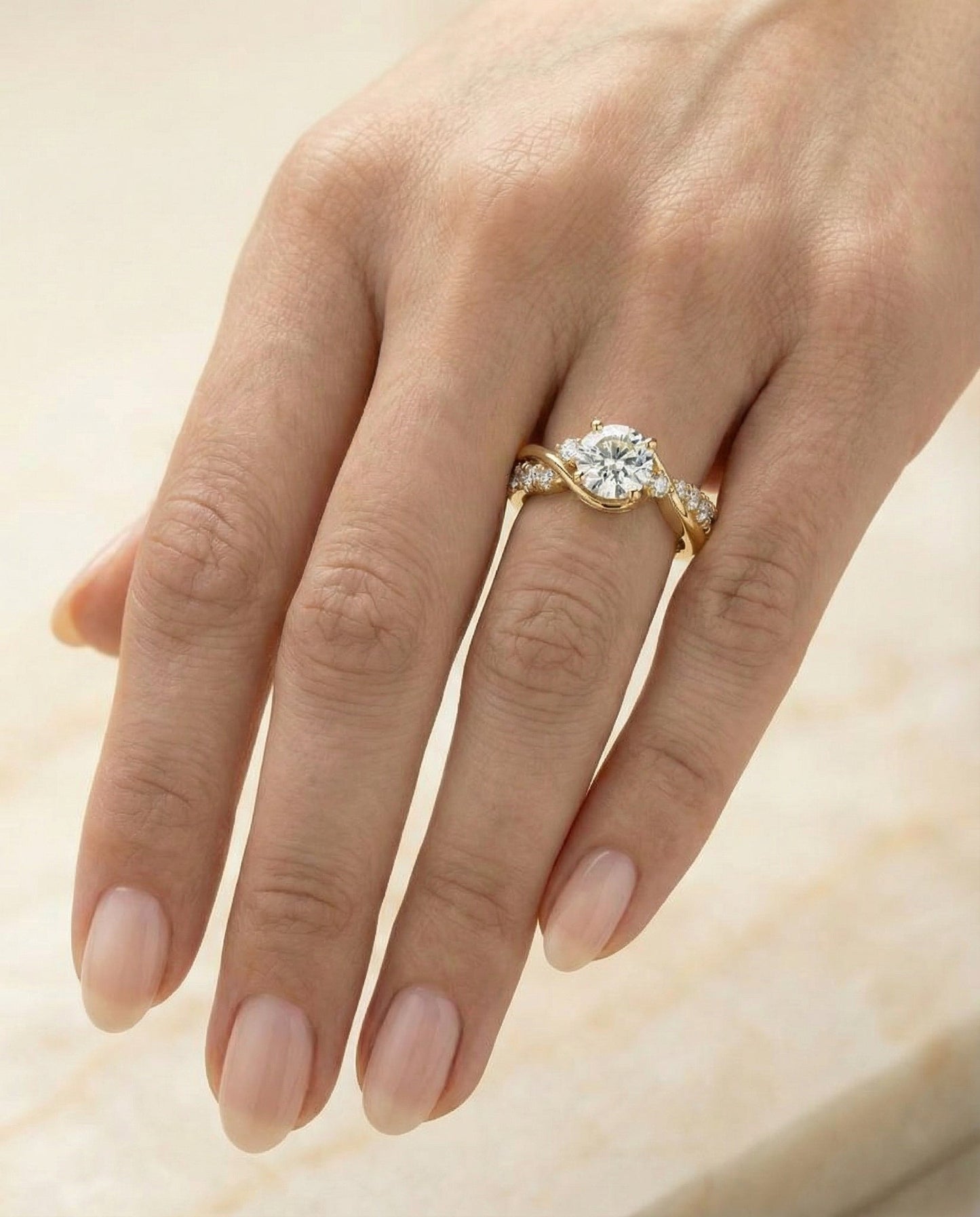 Round Brilliant, Twisted Three Stone, in 18K Yellow Gold – lifestyle shot | RockHer