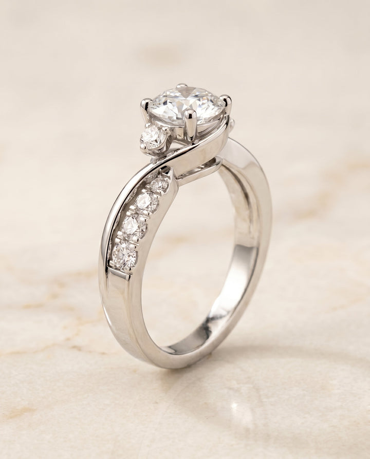 Round Brilliant, Twisted Three Stone, in 18K White Gold – front view | RockHer