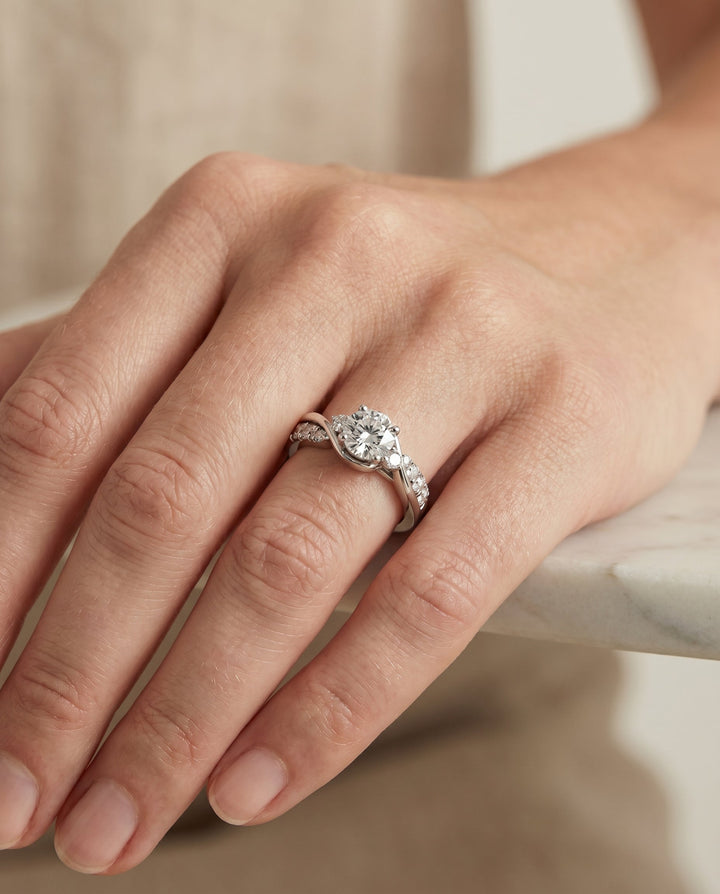 Round Brilliant, Twisted Three Stone, in 18K White Gold – lifestyle shot | RockHer