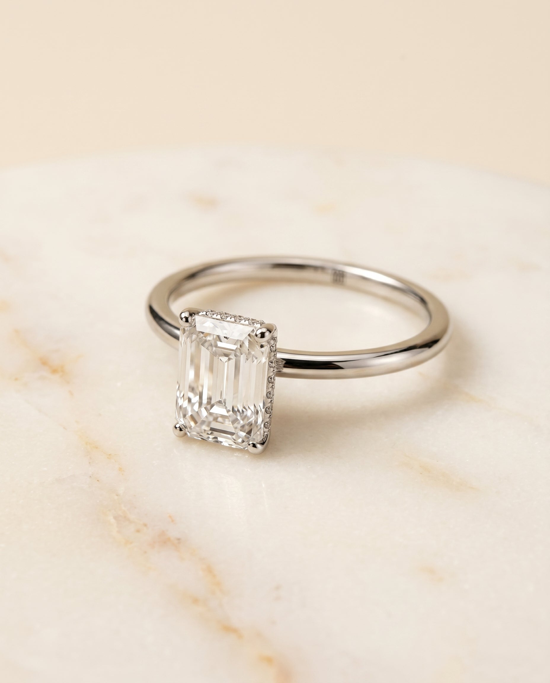 The Eartha Hidden Halo Solitaire Engagement Ring Setting for Emerald Cut Diamonds in 18K White Gold | RockHer