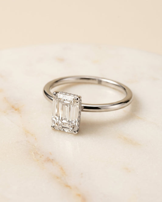 The Eartha Hidden Halo Solitaire Engagement Ring Setting for Emerald Cut Diamonds in 18K White Gold | RockHer