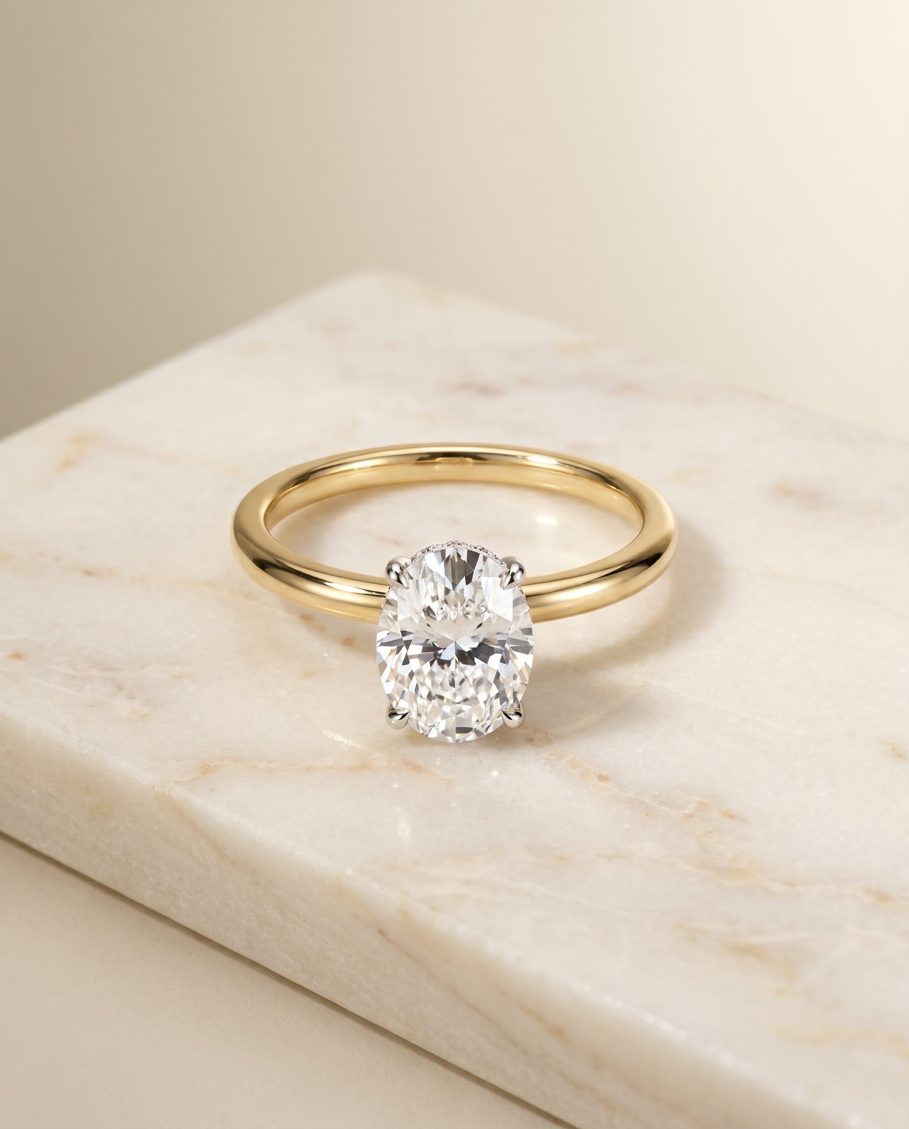The Eartha Hidden Halo Solitaire Engagement Ring Setting for Oval Diamonds in 18K Yellow Gold | RockHer