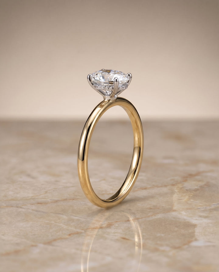 The Eartha Hidden Halo Solitaire Engagement Ring Setting for Oval Diamonds in 18K Yellow Gold