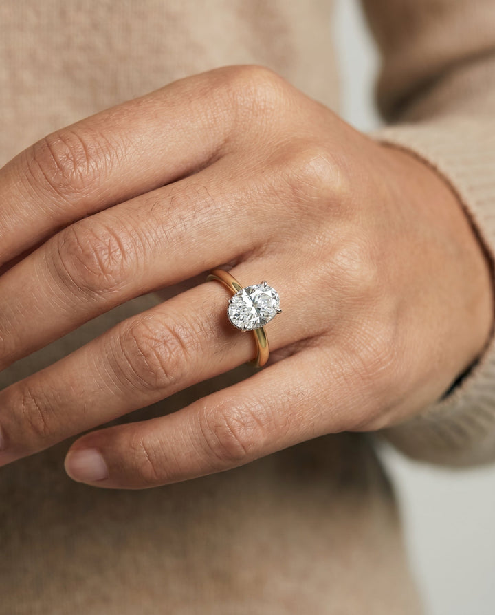 The Eartha Hidden Halo Solitaire Engagement Ring Setting for Oval Diamonds in 18K Yellow Gold