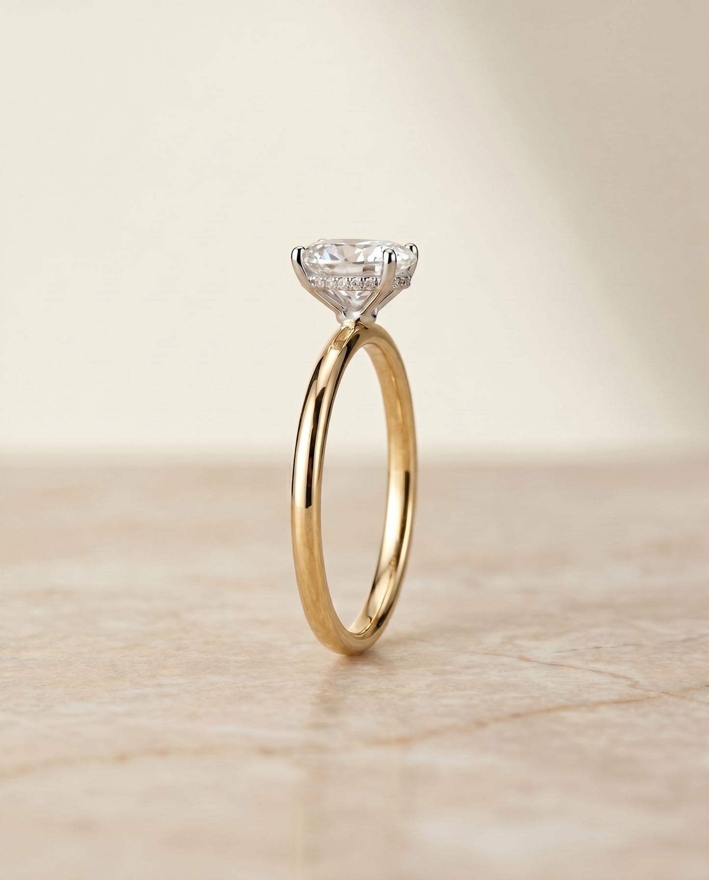 The Eartha Hidden Halo Solitaire Engagement Ring Setting for Oval Diamonds in 18K Yellow Gold