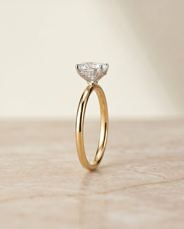 The Eartha Hidden Halo Solitaire Engagement Ring Setting for Oval Diamonds in 18K Yellow Gold