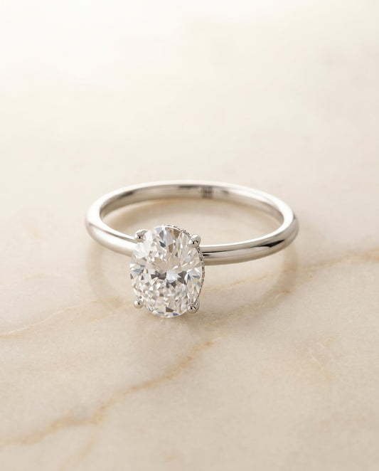 The Eartha Hidden Halo Solitaire Engagement Ring Setting for Oval Diamonds in Platinum | RockHer