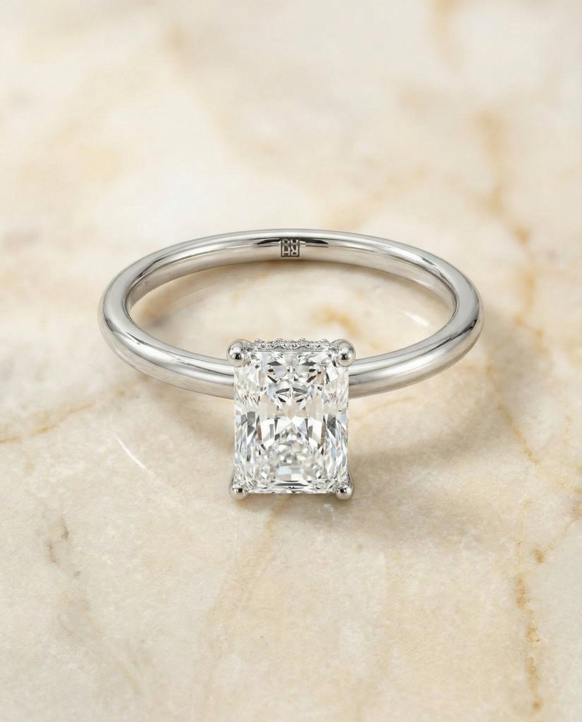 Upper Hidden Halo Solitaire Radiant, in Platinum – angled view | RockHer