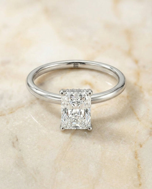 Upper Hidden Halo Solitaire Radiant, in Platinum – angled view | RockHer