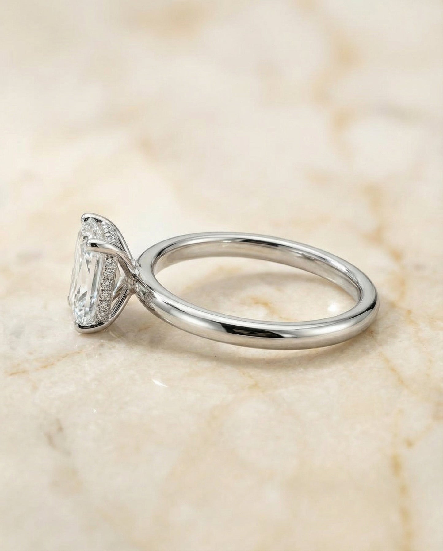 Upper Hidden Halo Solitaire Radiant, in Platinum – side profile | RockHer