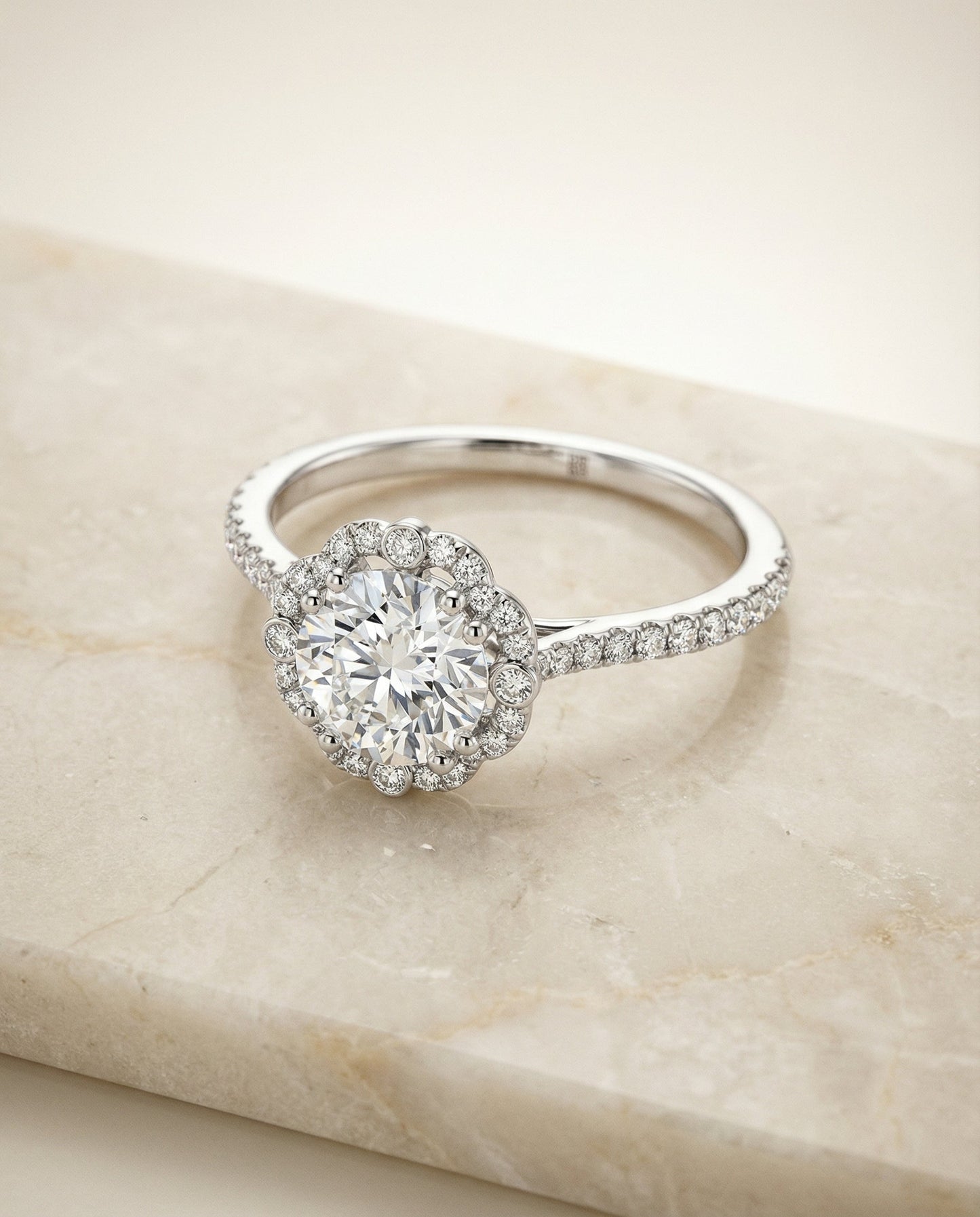 Round Brilliant, Vintage Scalloped Halo, in Platinum, pave setting – angled view | RockHer